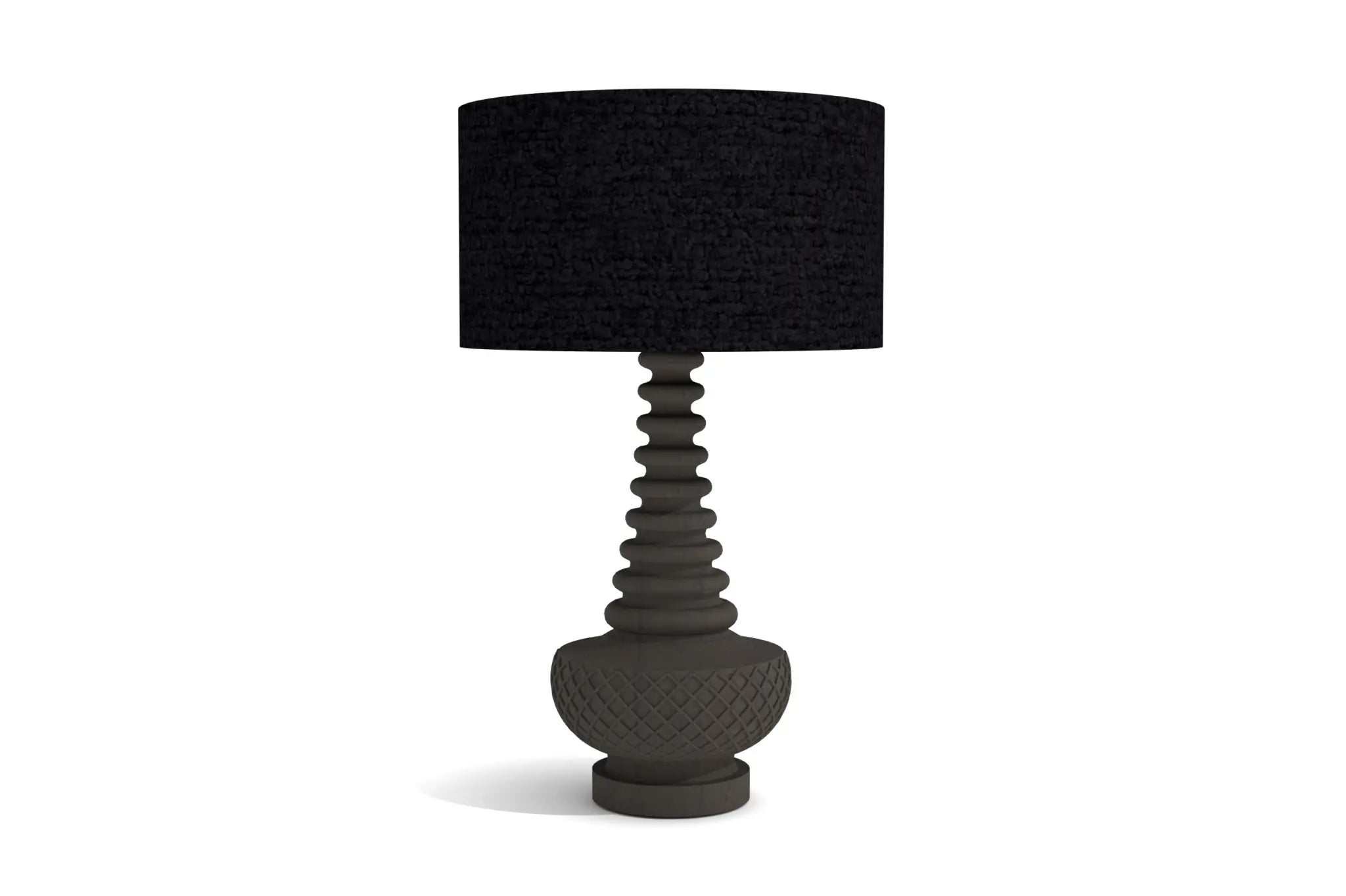Zulo Table Lamp with sculpted geometric base and woven fabric shade.