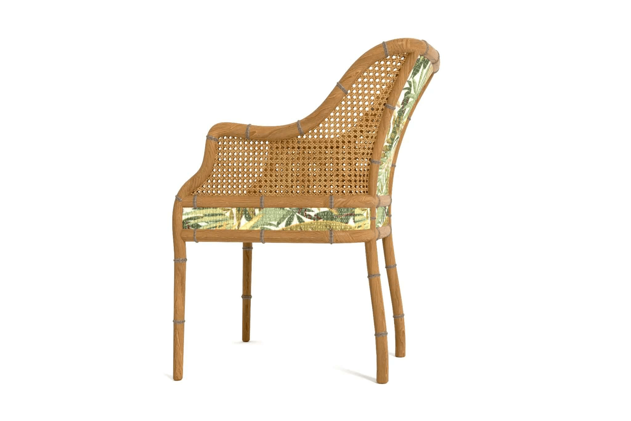 Carlton Dining Chair with wooden frame, bamboo details, handwoven cane backrest, and tropical fabric upholstery