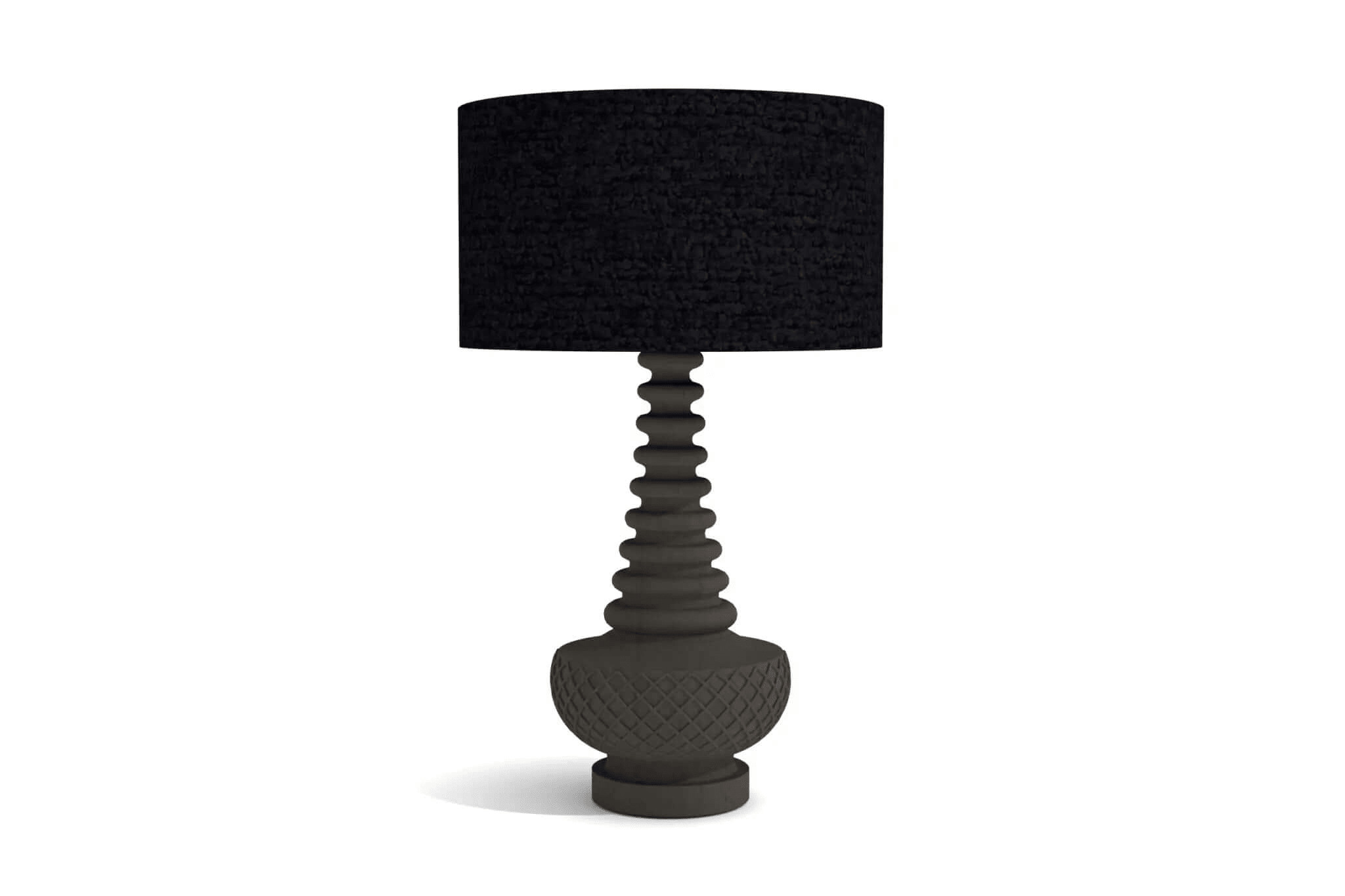 Zulo Table Lamp with sculpted geometric base and woven fabric shade in modern interior setting