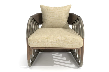 Juntos Lounge Chair with brass frame, walnut accents, and linen cushions.